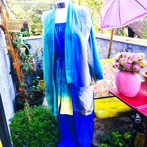 1980s pastel jumpsuit with matching belt and coat